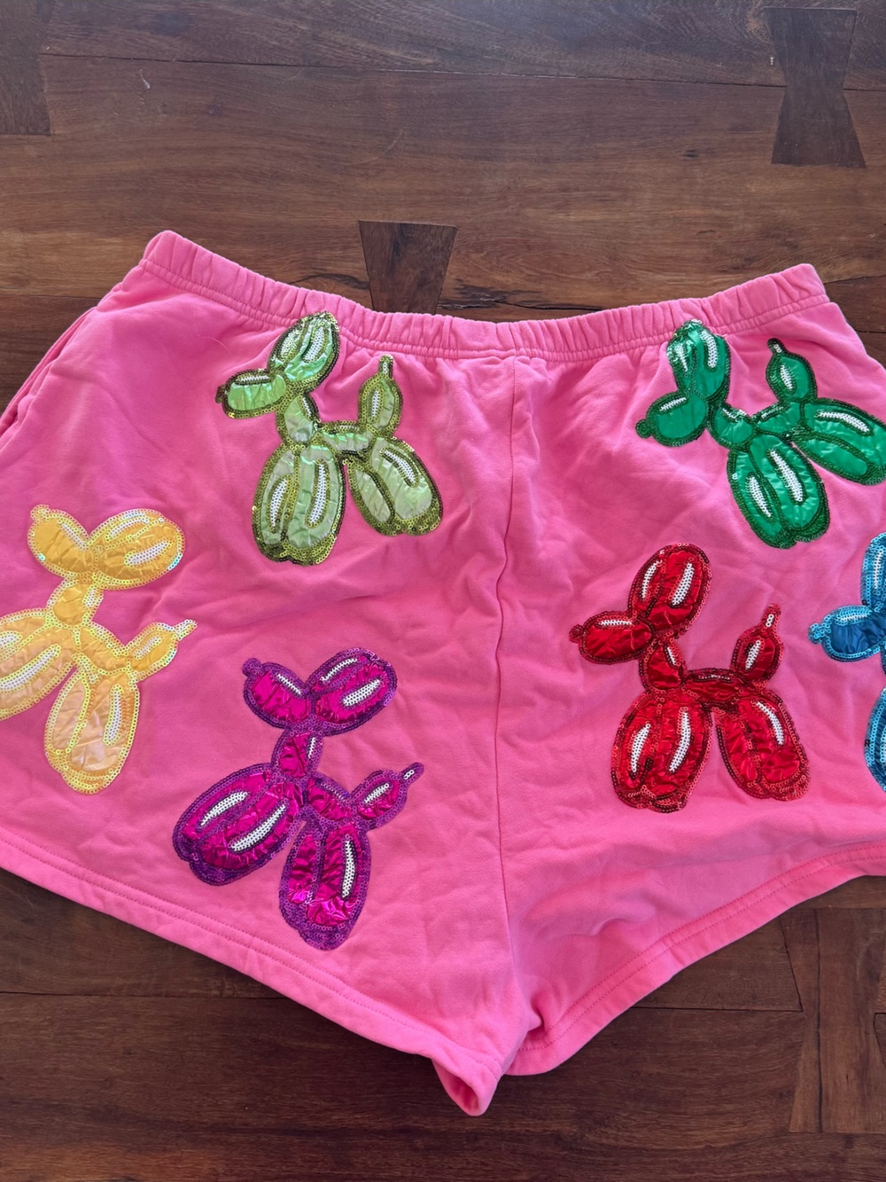 QUEEN OF SPARKLES Bright Pink Sequin Balloon-Animal Athletic Shorts
